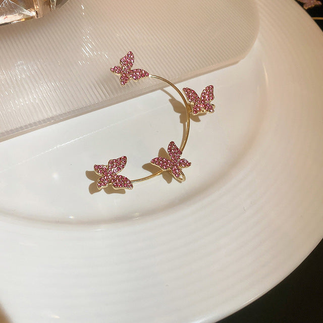 مشابك أذن على شكل فراشة معدنية باللون الذهبي والفضي بدون ثقب